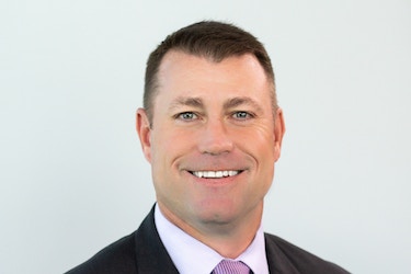  Headshot of Cauldon Quinn, Co-founder and Chief Executive Officer of Bancroft Capital. 